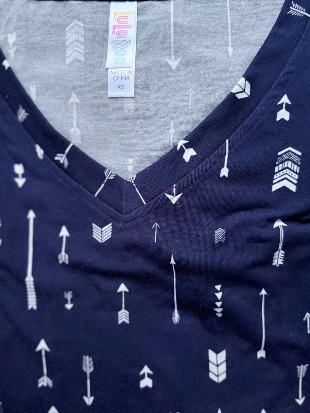 LuLaRoe Navy and White Arrow Print V-Neck Tee
